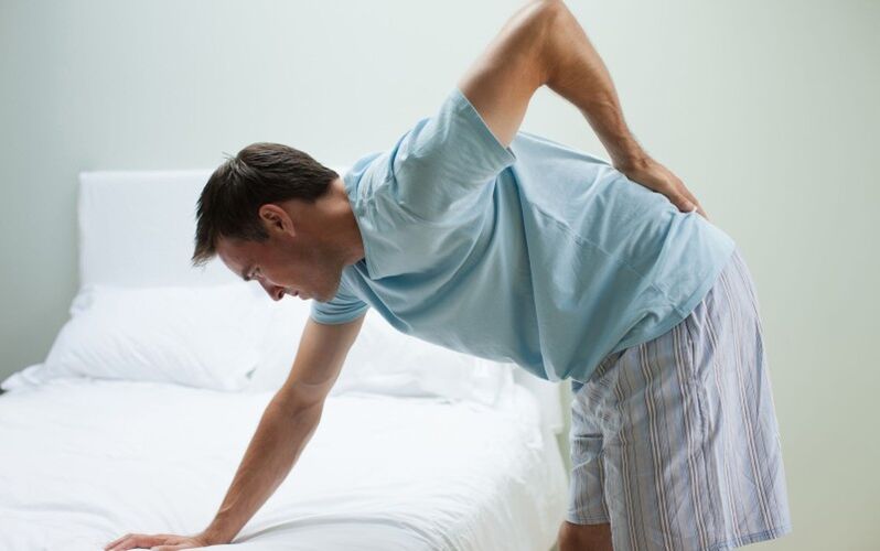 back pain in the lumbar region in a male